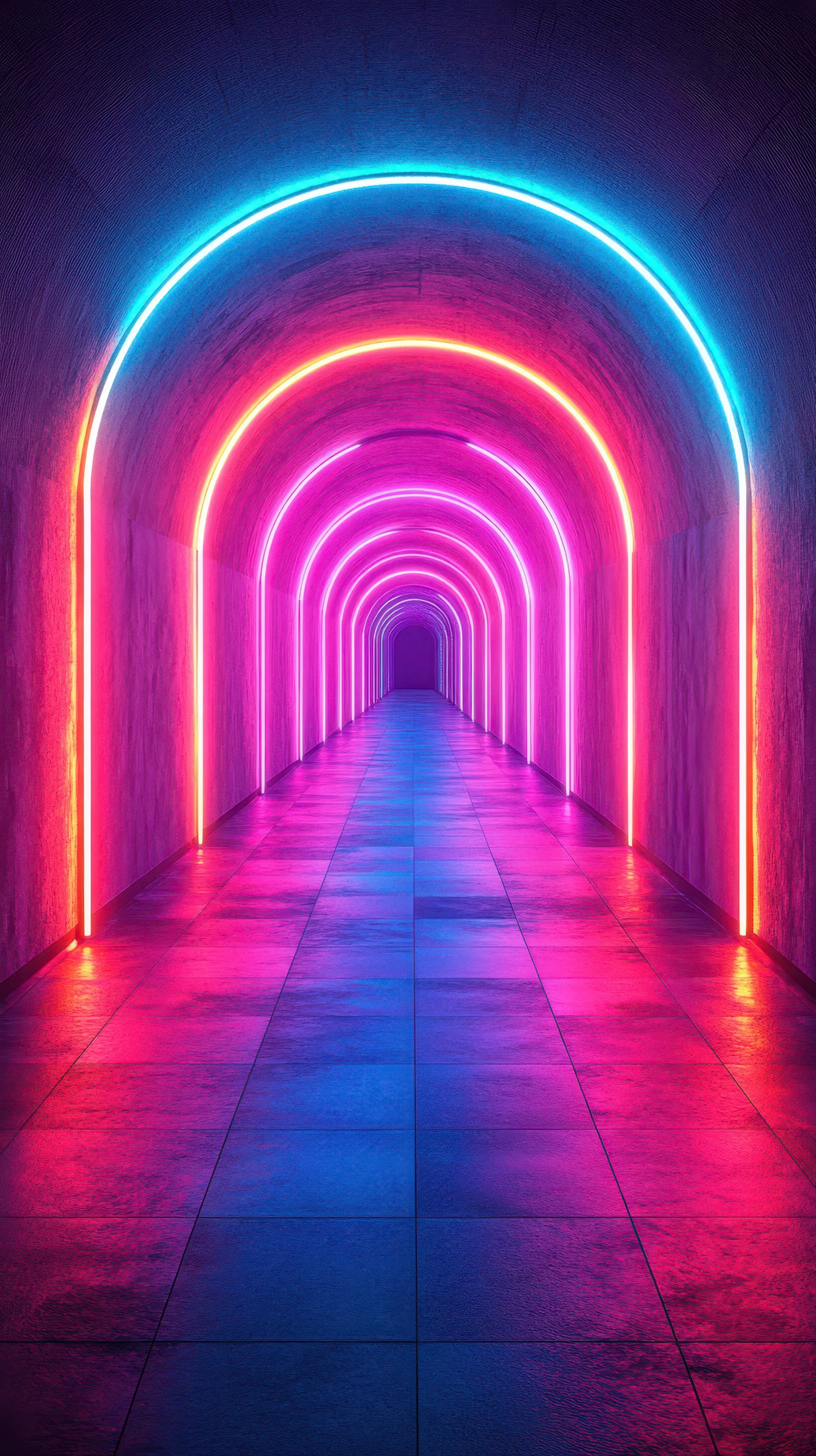 Colorful neon arches illuminate a deep tunnel in a striking display of light and perspective at night